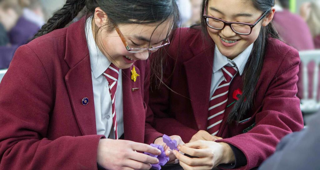 Students collaborating on a puzzle